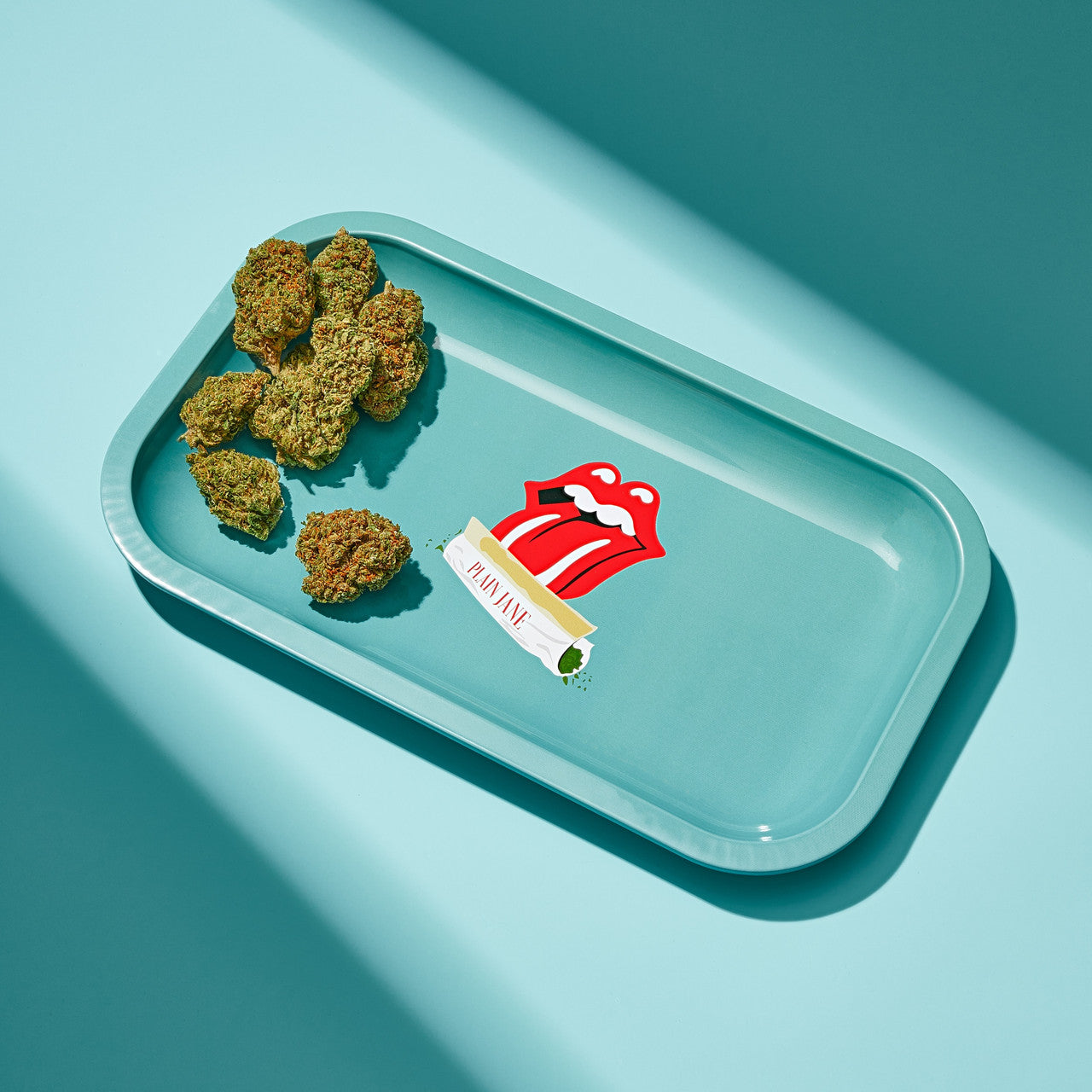 Is the Plain Jane Metal Rolling Tray suitable for travel purposes?